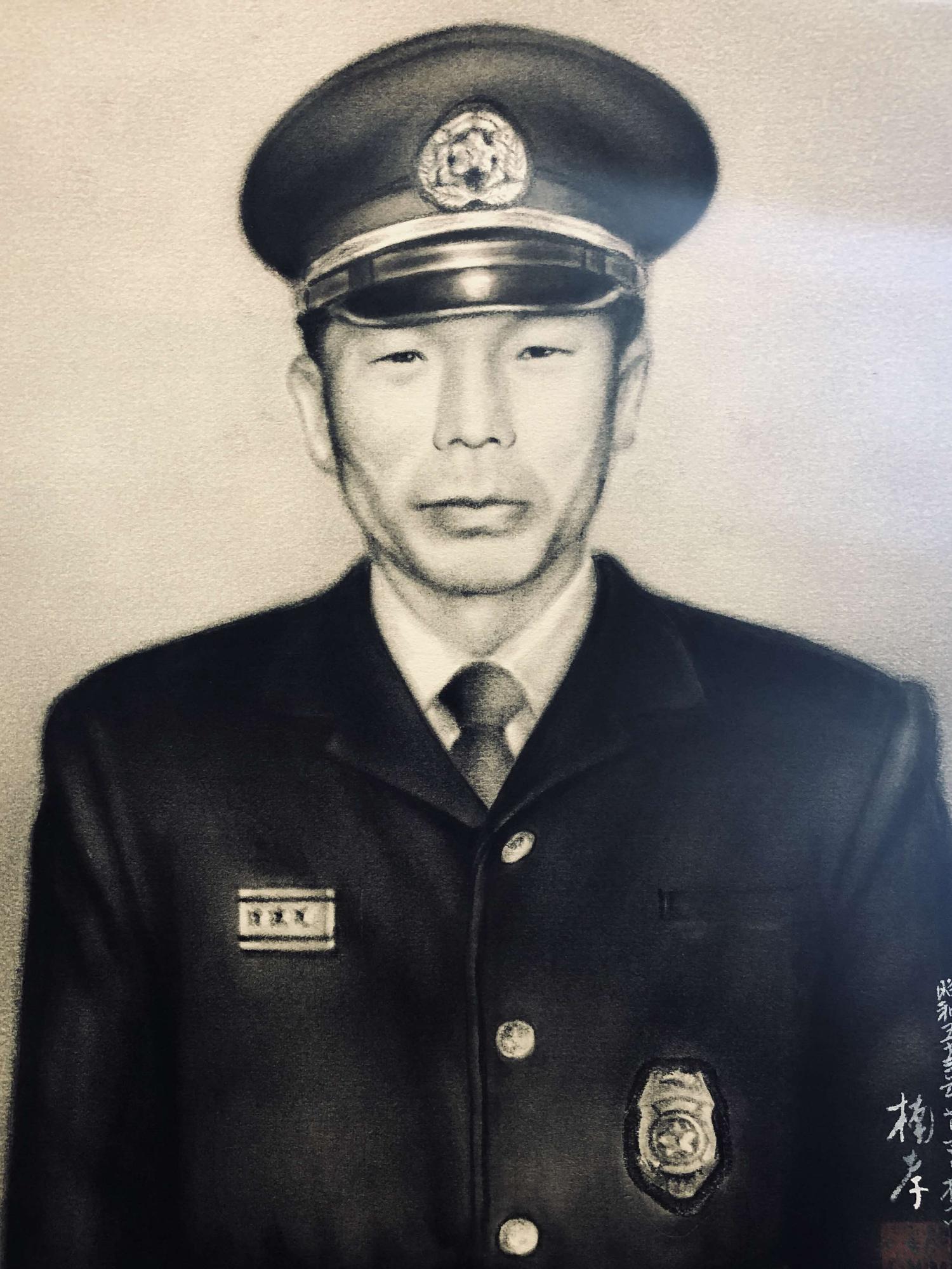 第3代 消防団長 近藤 俊平氏の肖像画
