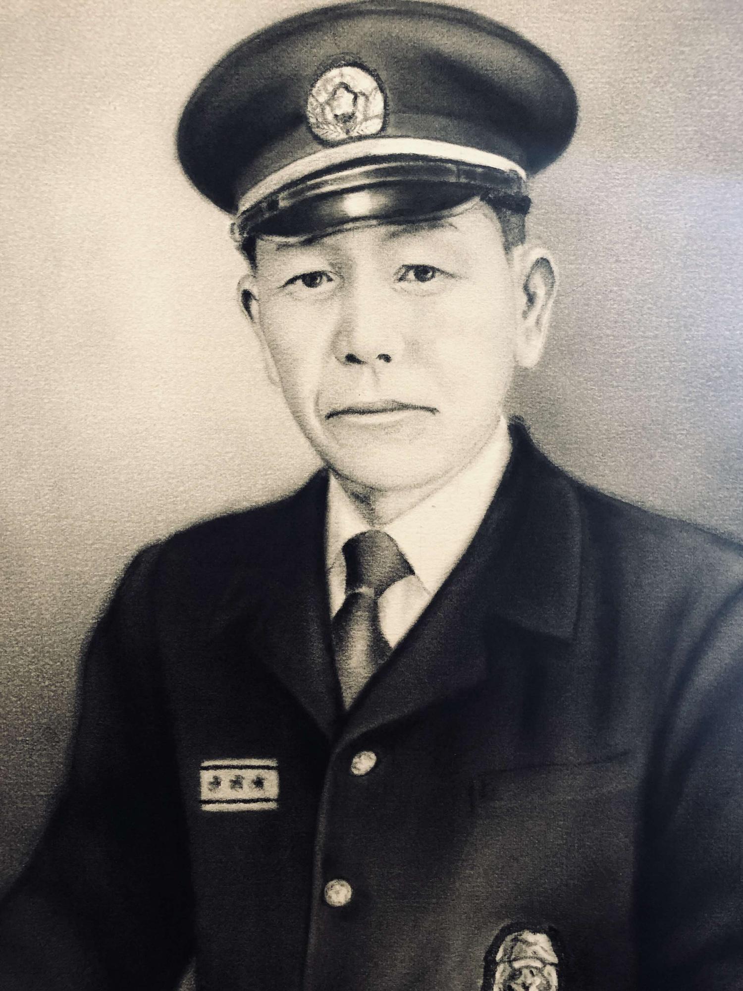 第9代 消防団長 栗原 利光氏の肖像画