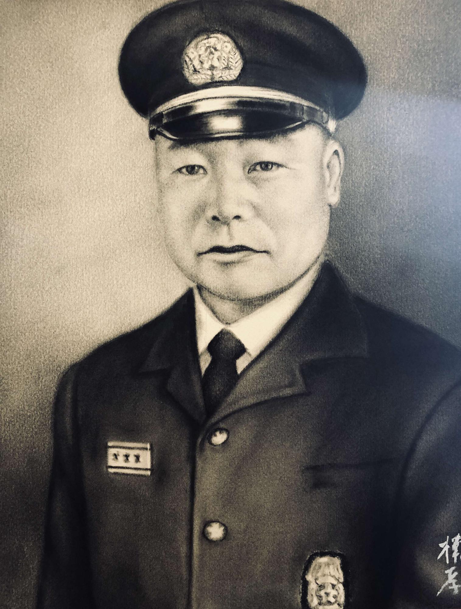 第10代 消防団長 鈴木 進氏の肖像画