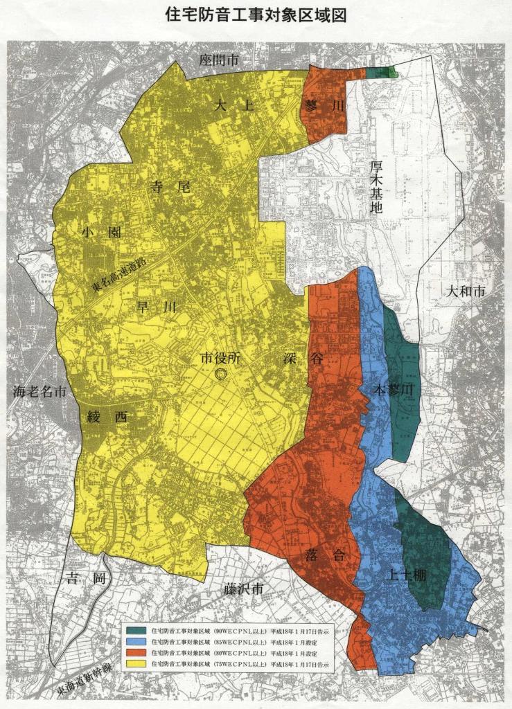 住宅防音工事対象区域を騒音の単位ごとに緑・青・オレンジ・黄色で色付けした綾瀬市の地形図